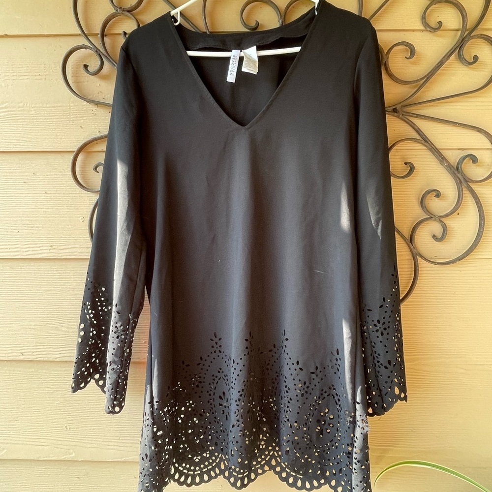 Swimsuit cover-up that can be paired with pants/skirt.